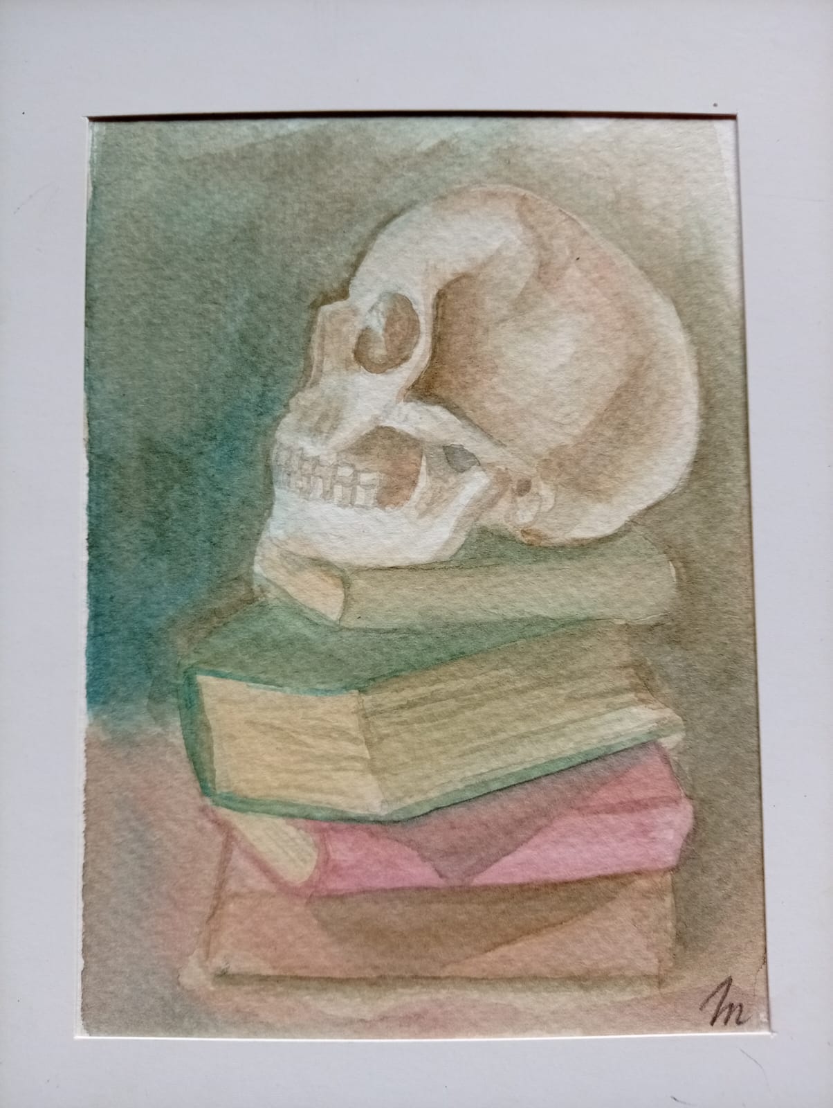 Pequeño estudio de cráneo y libros
